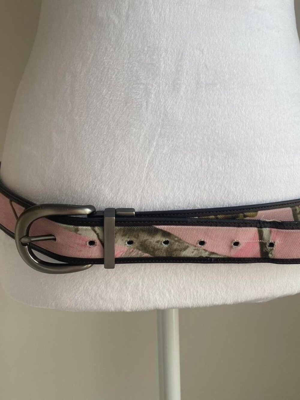 pink camo belt with silver buckle